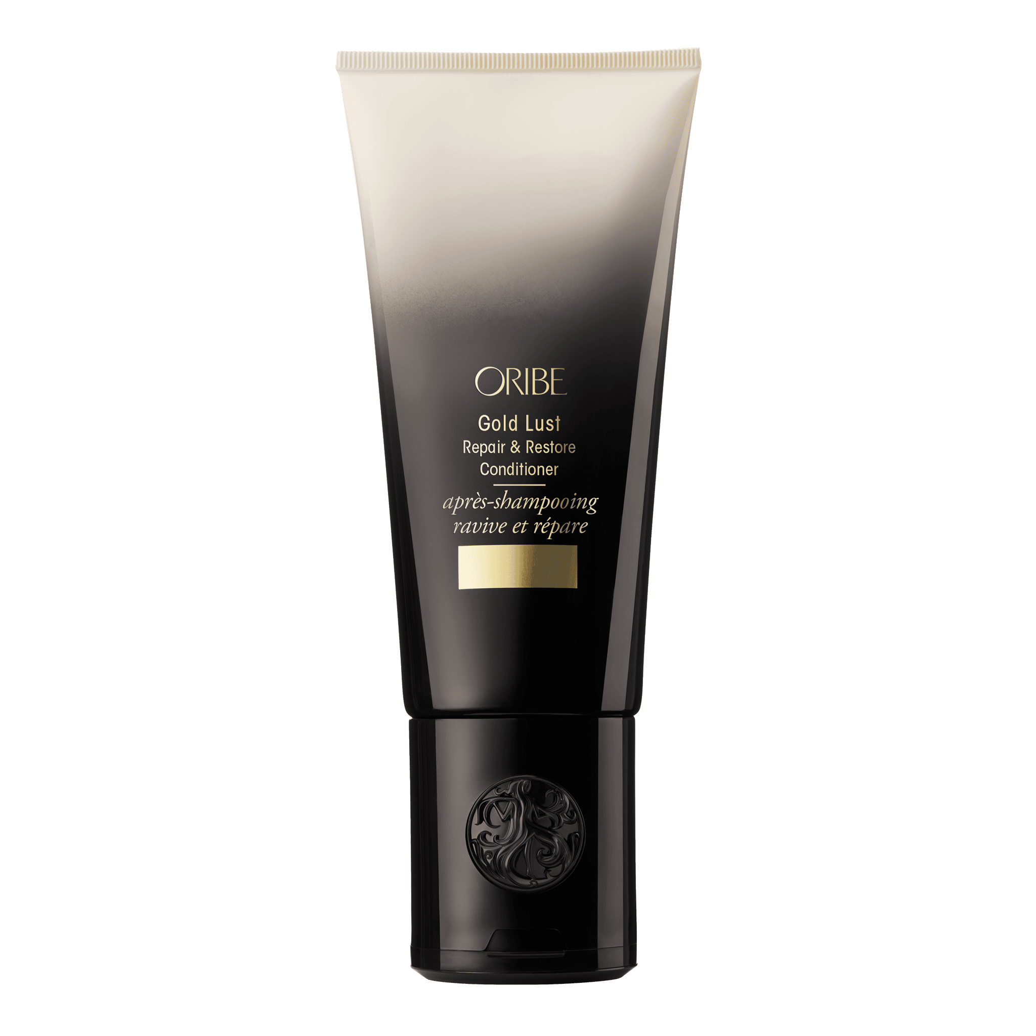 Oribe Gold Lust Repair & Restore Conditioner in a black and White Ombre Container