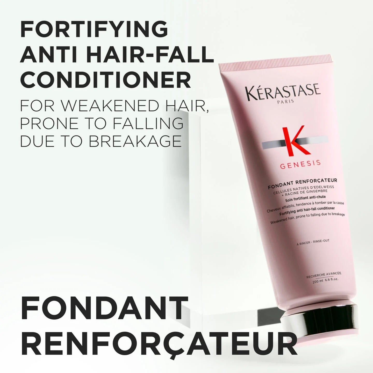 Kérastase conditioner bottle with text about fortifying anti-hair fall treatment on a white background
