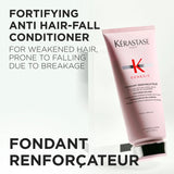 Kérastase conditioner bottle with text about fortifying anti-hair fall treatment on a white background