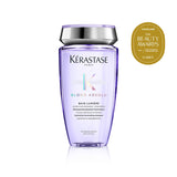 Kérastase Blond Absolu shampoo bottle with award on a white background Curious Salons Canada