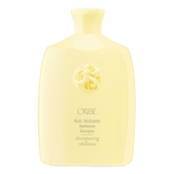 Oribe Hair Alchemy Resilience Shampoo in yellow container