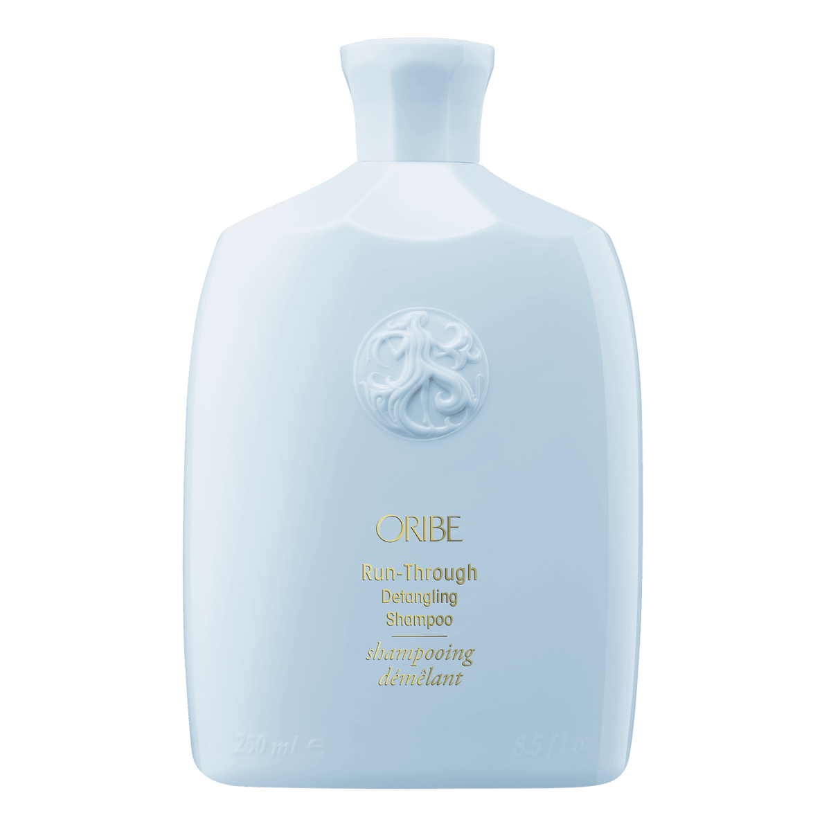Oribe Run-Through Detangling Shampoo in White Glossy Bottle