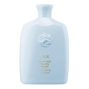 Oribe Run-Through Detangling Shampoo in White Glossy Bottle