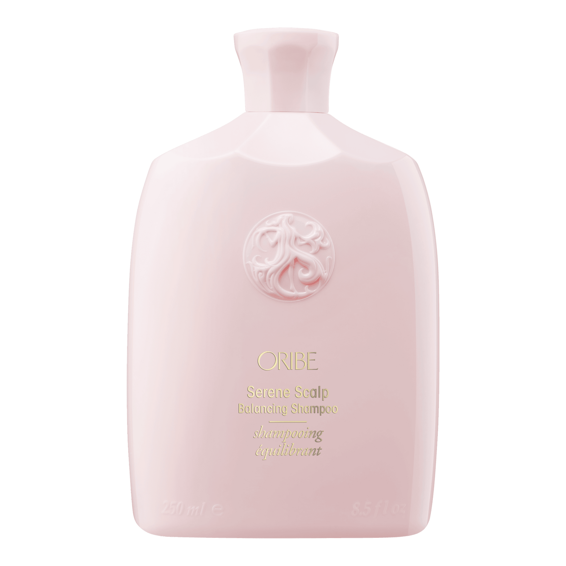 Oribe Serene Scalp Shampoo in a light pink bottle